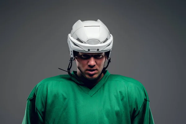 Jugador de hockey sostiene palo de hielo —  Fotos de Stock