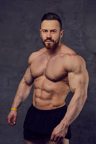 Shirtless bearded bodybuilder