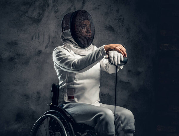 Female paralympic wheelchair fencer