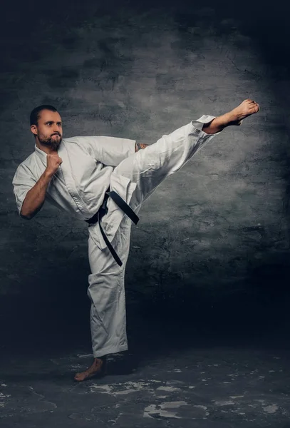 Bearded karate fighter in action — Stock Photo, Image