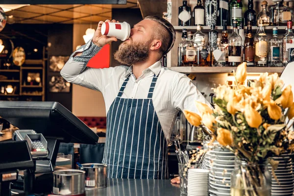 The bearded coffee seller — Stock Photo, Image