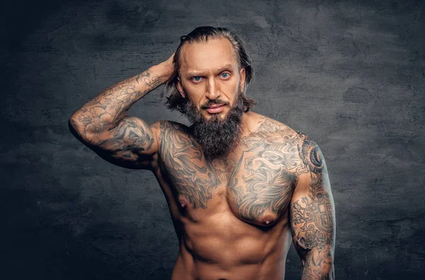 Tattooed bearded man — Stock Photo, Image
