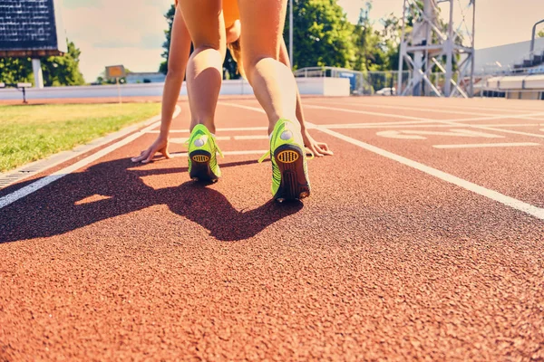 Back view of female runner — Stock Photo, Image