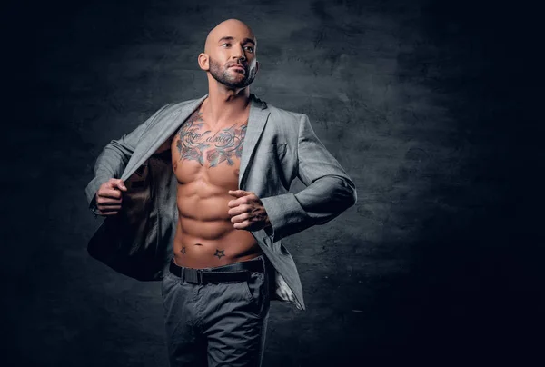 Man in a grey jacket on a naked torso — Stock Photo, Image