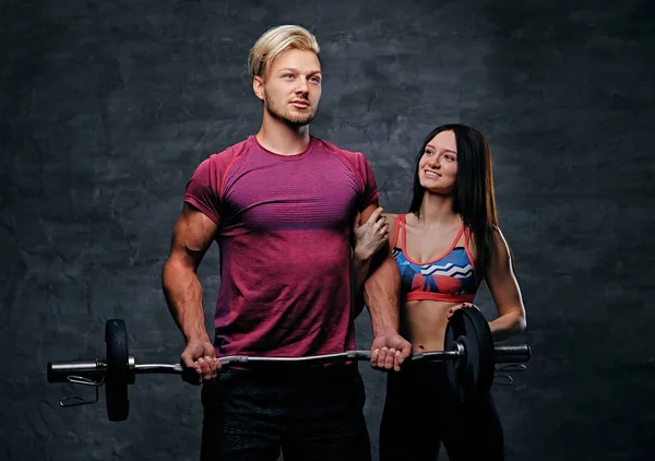 Férfi és nő súlyzó — Stock Fotó