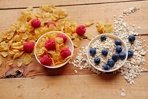 Golden corn flakes and some berries