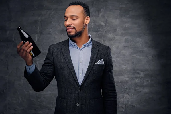 Black American man tasting beer