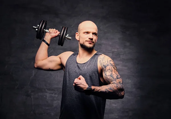 Athletic man with dumbbell — Stock Photo, Image
