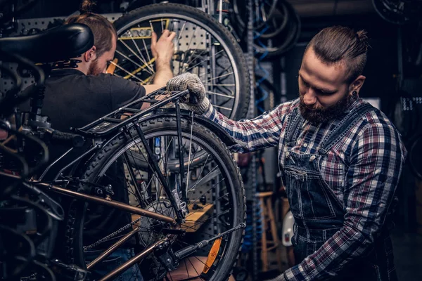 Bearded mechanic in a workshop