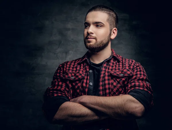 Studio portrait of bearded male