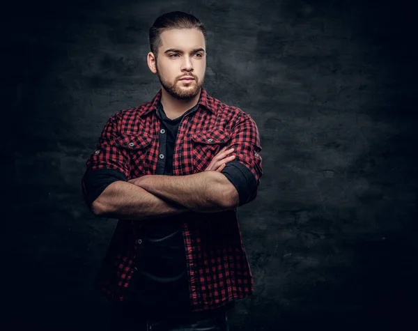 Studio portrait of bearded male