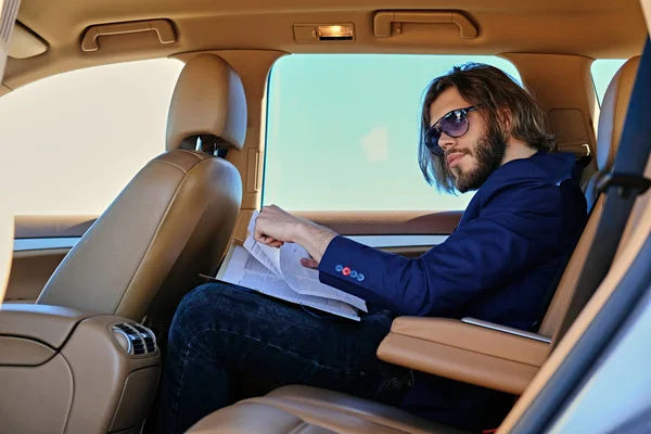 Man working with paper documents