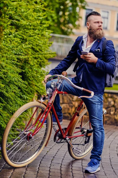 Man in a park using by smart phone — Stock Photo, Image