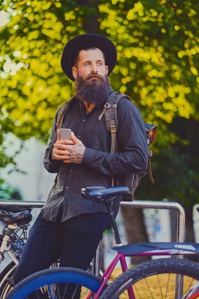 Bearded hipster male with backpack — Stock Photo, Image