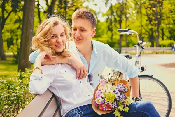 Attractive young couple hugging — Stock Photo, Image