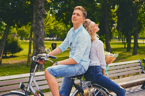 Couple riding on the bicycle — Stock Photo, Image