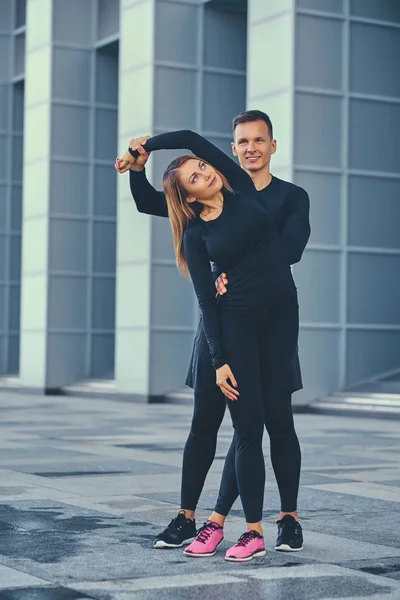 Fitness pareja estiramiento — Foto de Stock