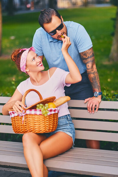 Picnic on a bench in a park