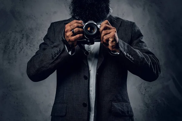 Elegant bearded professional photographer