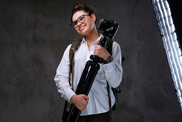 Female holds digital photo camera — Stock Photo, Image