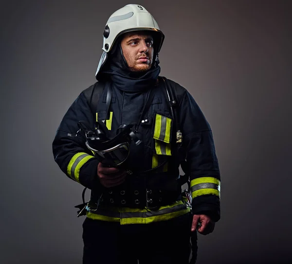 Firefighter in safety helmet.