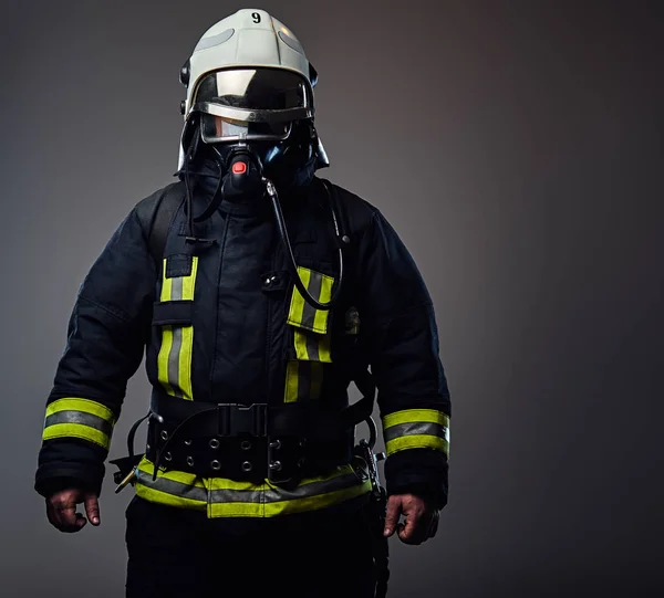 Fireman dressed in uniform — Stock Photo, Image