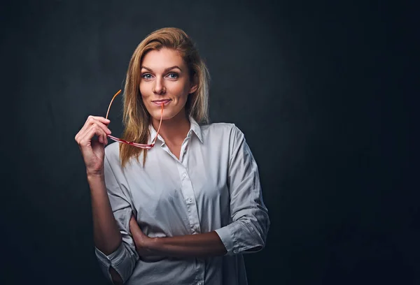 Blond female dressed in a white shirt — Stock Photo, Image