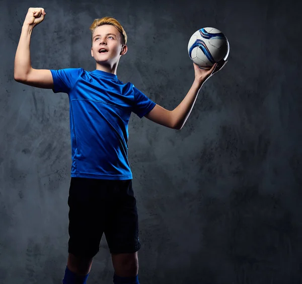 Soccer player dressed in a blue uniform — Stock Photo, Image