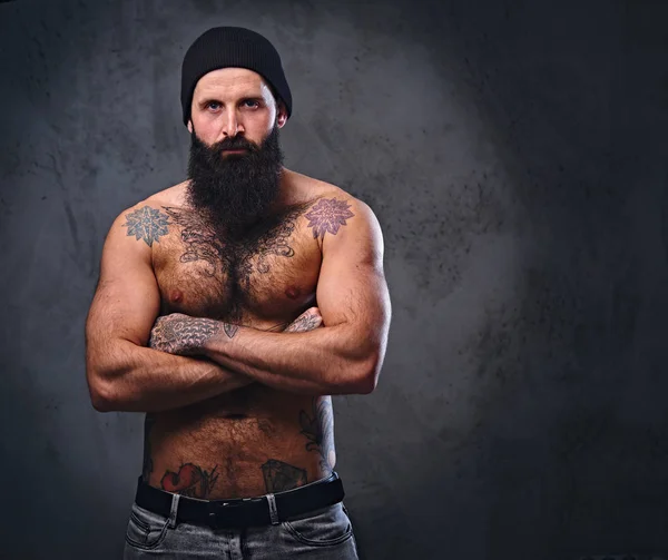 Shirtless muscular, bearded male in hat — Stock Photo, Image