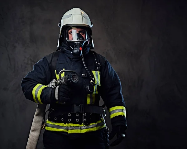 Fireman dressed in uniform — Stock Photo, Image