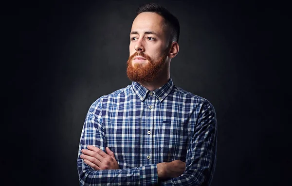 Thoughtful redhead bearded man