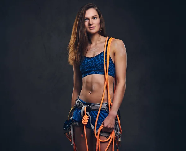 Femmina arrampicatore tiene corda — Foto Stock