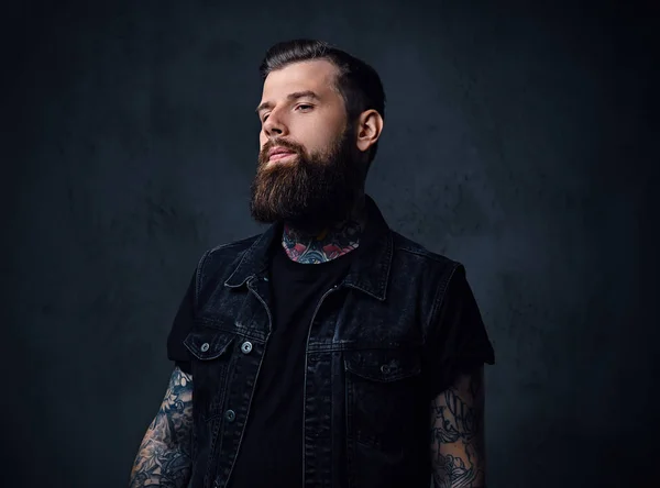 Bearded hipster male with tattoos on his arms — Stock Photo, Image