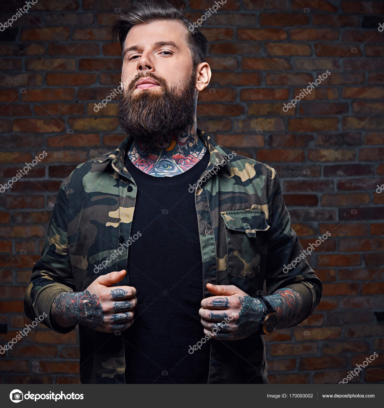 Tattooed bearded male in military jacket. Stock Photo by ©fxquadro 170093002 Tattooed bearded male in military jacket. Stock Photo by ©fxquadro 170093002