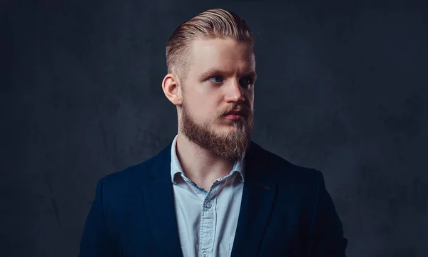 Portrait of stylish blond bearded male dressed in a suit. — Stock Photo, Image