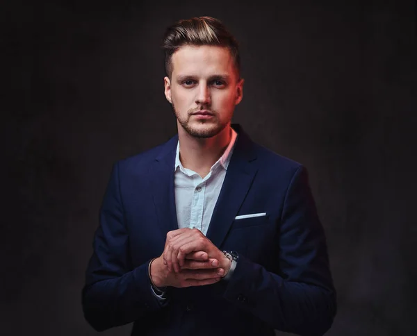 Attractive blond male dressed in a suit — Stock Photo, Image
