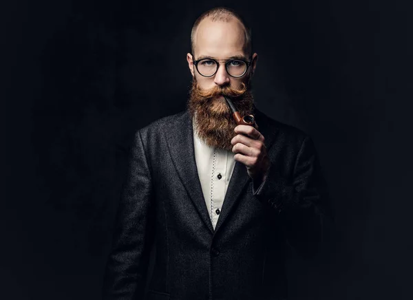 Portrait Bearded Redhead Russian Male Smoking Pipe Grey Background — стоковое фото