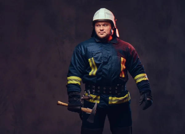 Studio Portrait Firefighter Uniform Holds Axe — Stock Photo, Image