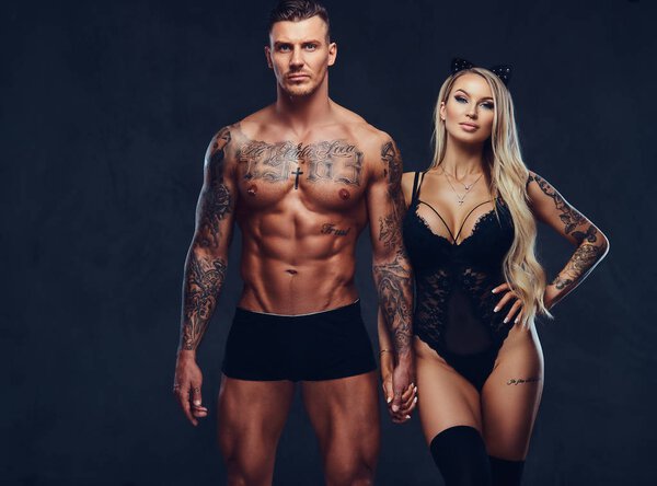 Beautiful couple, posing in studio.