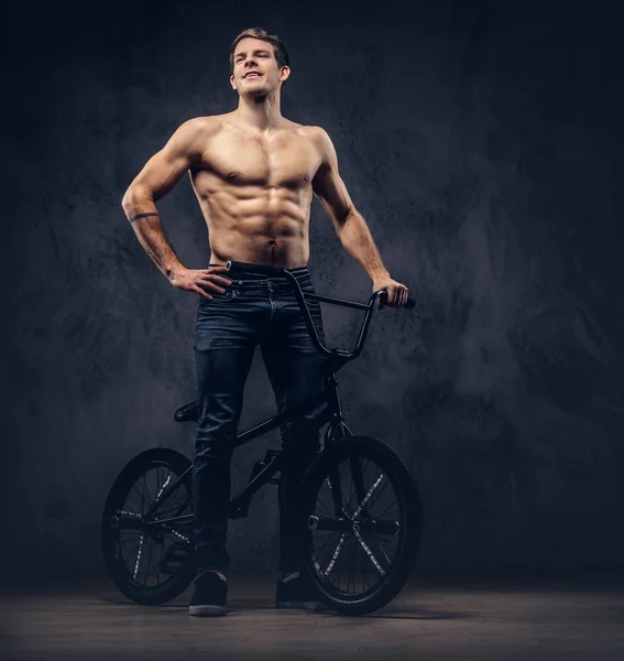 Handsome Smiling Shirtless Man Shirt Jeans Standing Bmx Isolated Dark — Stock Photo, Image