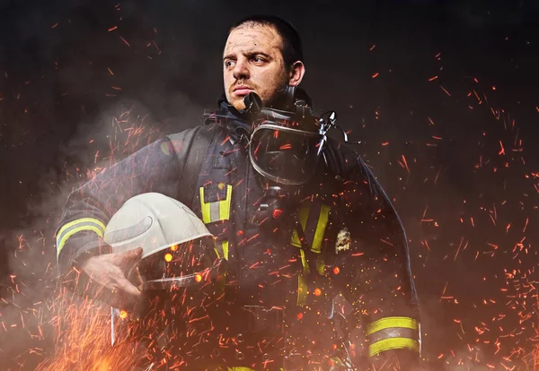 Professional Firefighter Dressed Uniform Holding Safety Helmet Fire Sparks Smoke — Stock Photo, Image