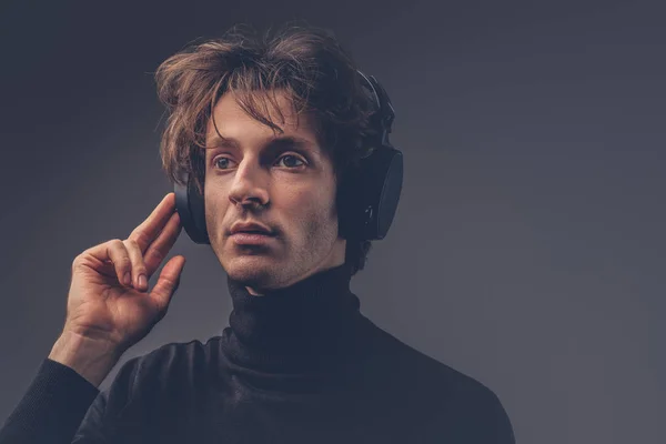 Portrait Creative Sensual Male Black Sweater Listening Music Headphones — Stock Photo, Image