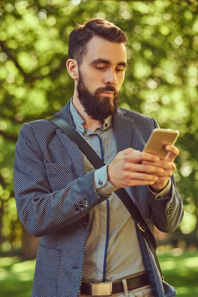 Portrait Bearded Male Stylish Haircut Casual Clothes Writes Message Phone — Stock Photo, Image