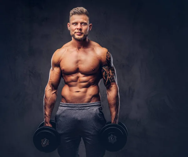 Powerful Stylish Bodybuilder Tattoo His Arm Posing Dumbbells Studio Isolated — Stock Photo, Image