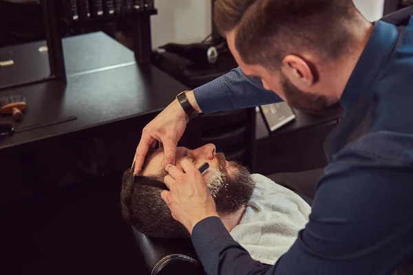 Handsome Hipster Bearded Male Sitting Armchair Barber Shop While Hairdresser — Stock Photo, Image