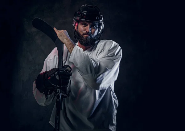 Experienced hockey player has a photo session — Stock Photo, Image