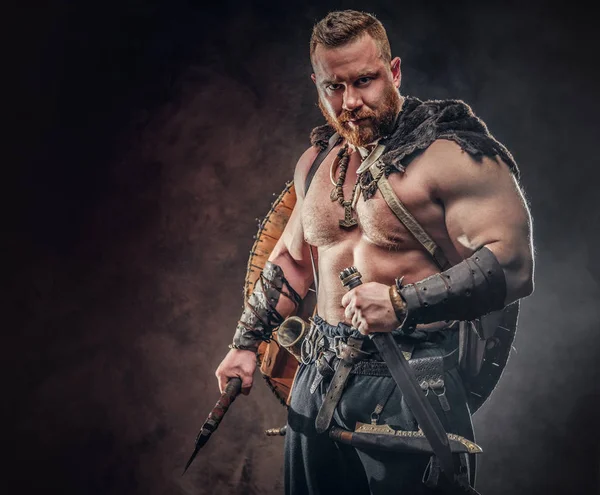 Severe barbarian in warrior clothes — Stock Photo, Image
