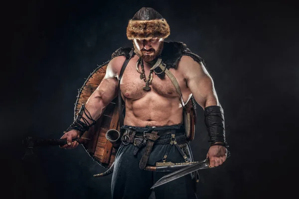 Severe barbarian in warrior clothes — Stock Photo, Image