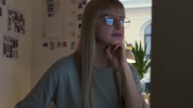 Attractive girl is working in the office