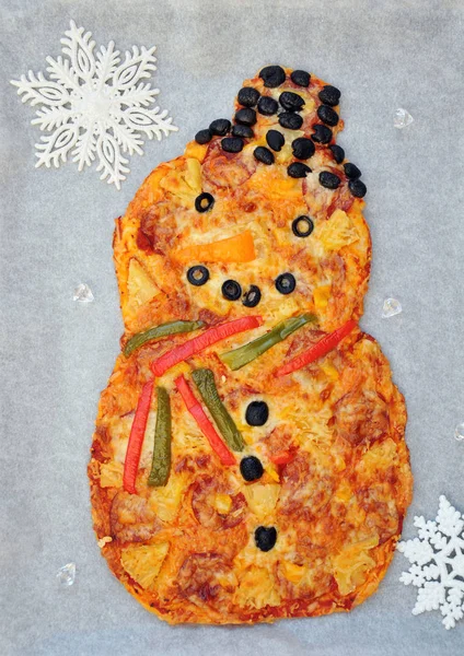 Sněhulák pizza - zábavné potravin nápad pro děti Stock Obrázky